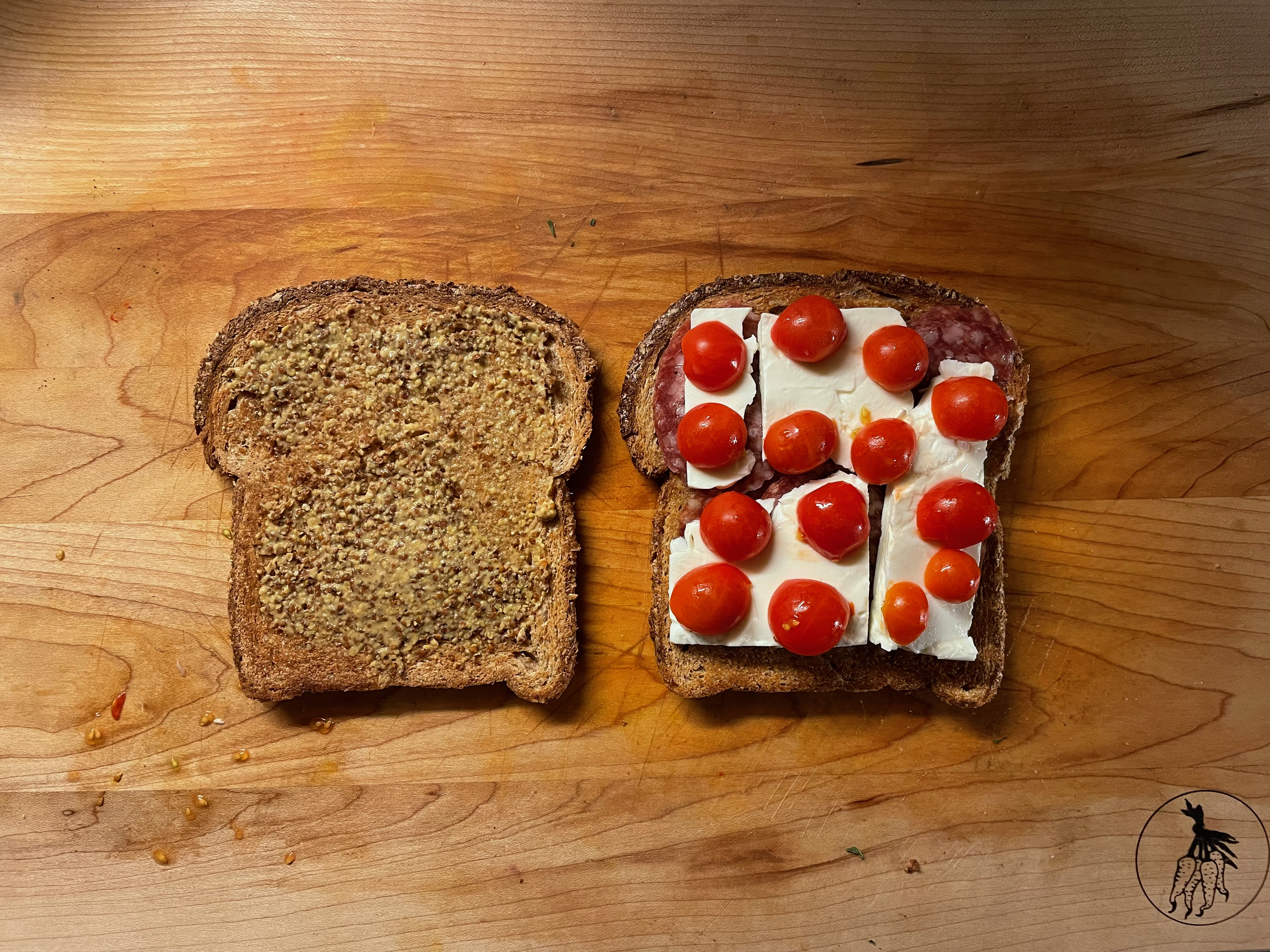 Feta Cheese, Sausage, Cherry Tomato, and Mustard Sandwich